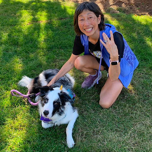 Patti Matsuda with Dubs, the UW Husky dog mascot.